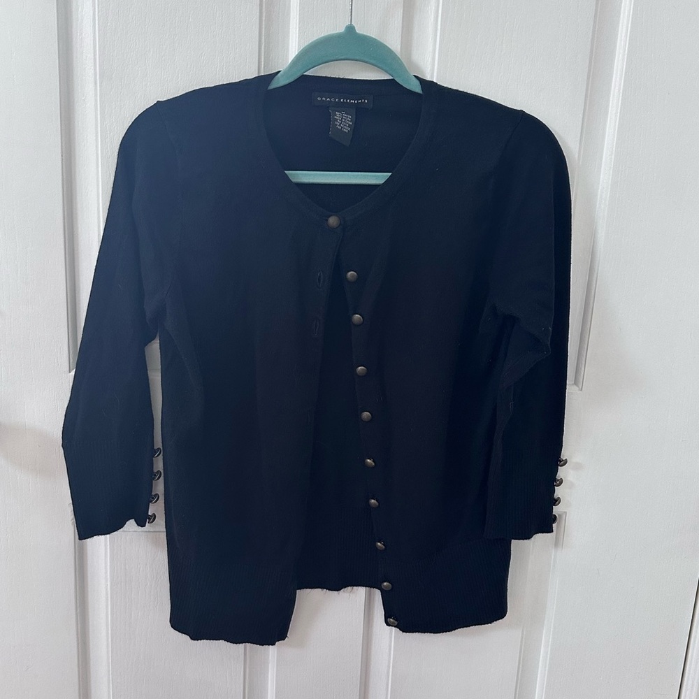 Grace Elements Black Sweater. Brass buttons on front and 3/4 length sleeve.
